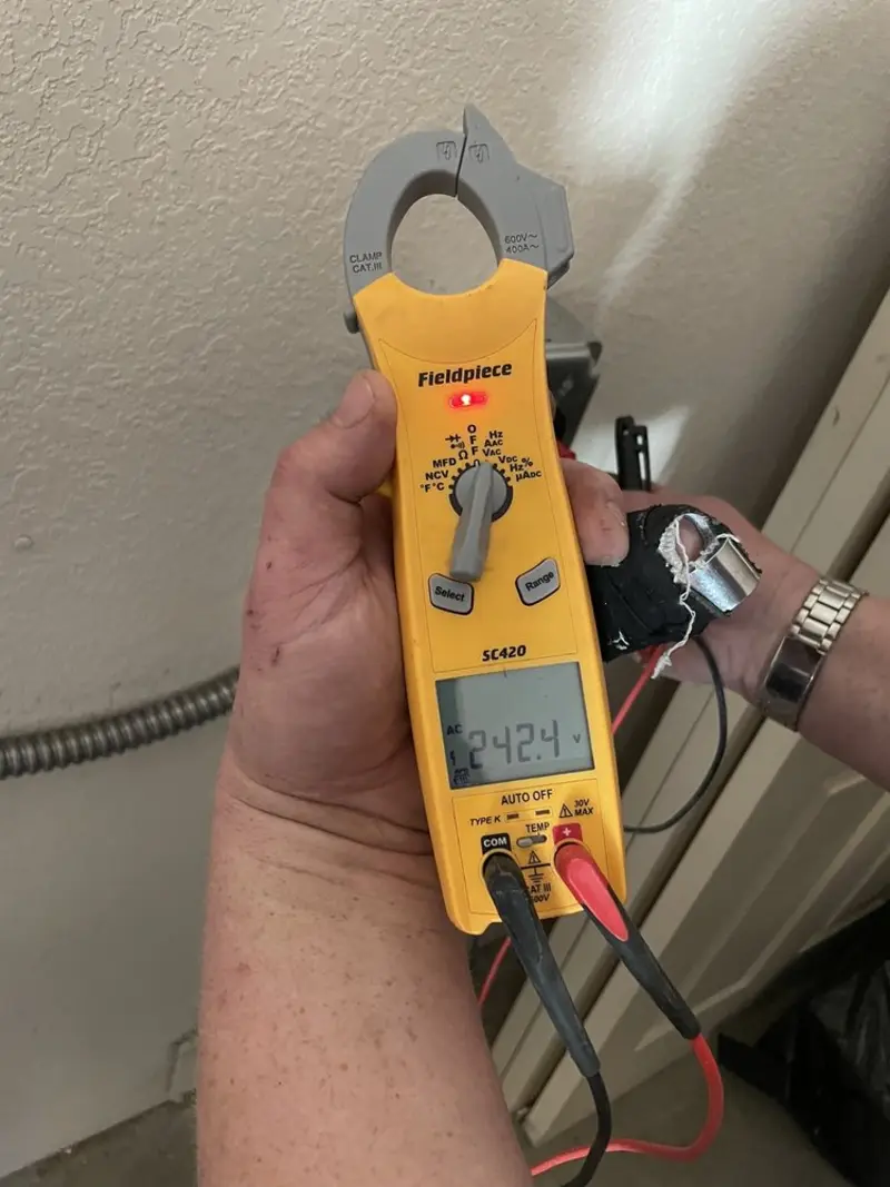 Voltage testing with clamp meter during Circuit Breaker Repair in Hilton Head Island